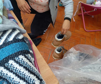 Rozvojový tím v akcii / Odevná banka - foto