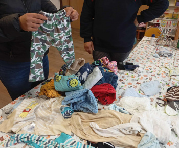Rozvojový tím v akcii / Výmena detského oblečenia - foto