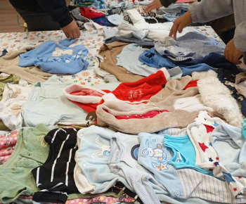 Rozvojový tím v akcii / Výmena detského oblečenia - foto