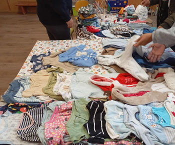 Rozvojový tím v akcii / Výmena detského oblečenia - foto